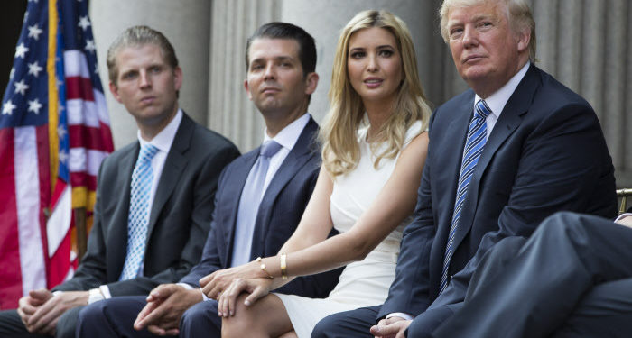 Donald Trump, Eric Trump, Donald Trump Jr., and Ivanka Trump during a ground breaking ceremony for the Trump International Hotel on the site of the Old Post Office, on Wednesday, July 23, 2014, in Washington. (